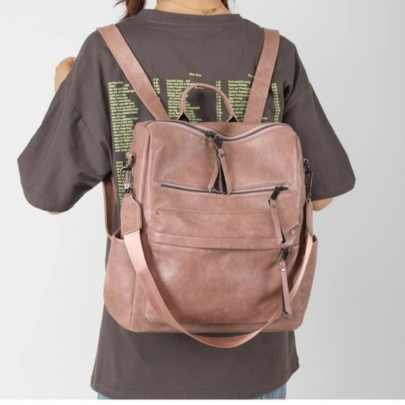Pink vegan leather zipper detail mini backpacks